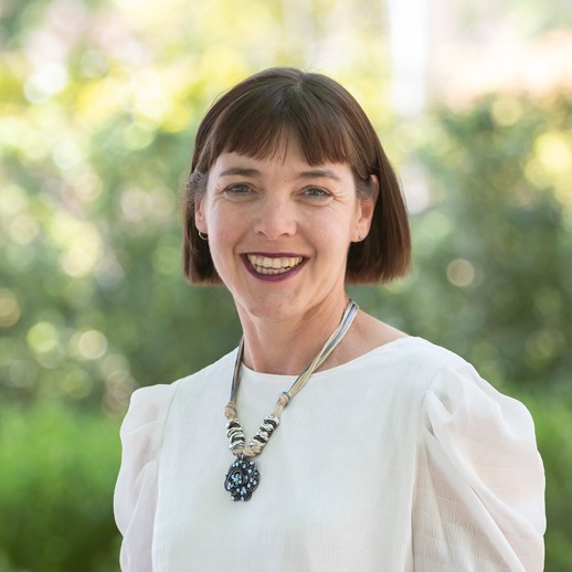 Cheryl Hulskamp Image of a woman in a white shirt smiling